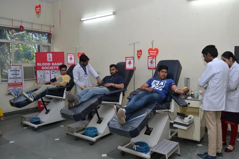 Youngsters giving blood